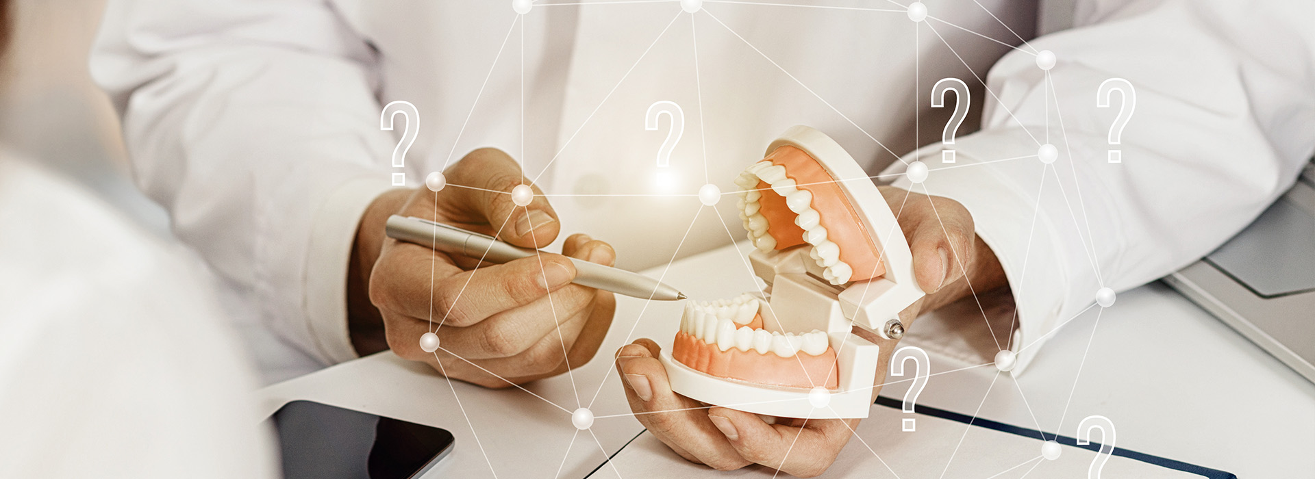 The image shows a person s hand holding a toothbrush with a question mark overlaying it, suggesting an interactive element like a quiz or survey about dental hygiene.